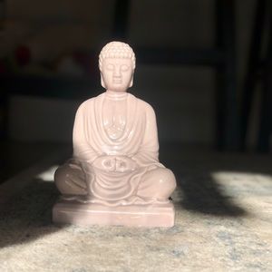 Buddha statue in a very light pink color from home goods